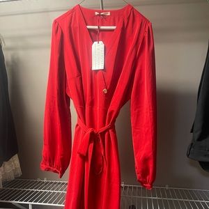 Beautiful red asymmetrical dress. Purchased from Belk last year.